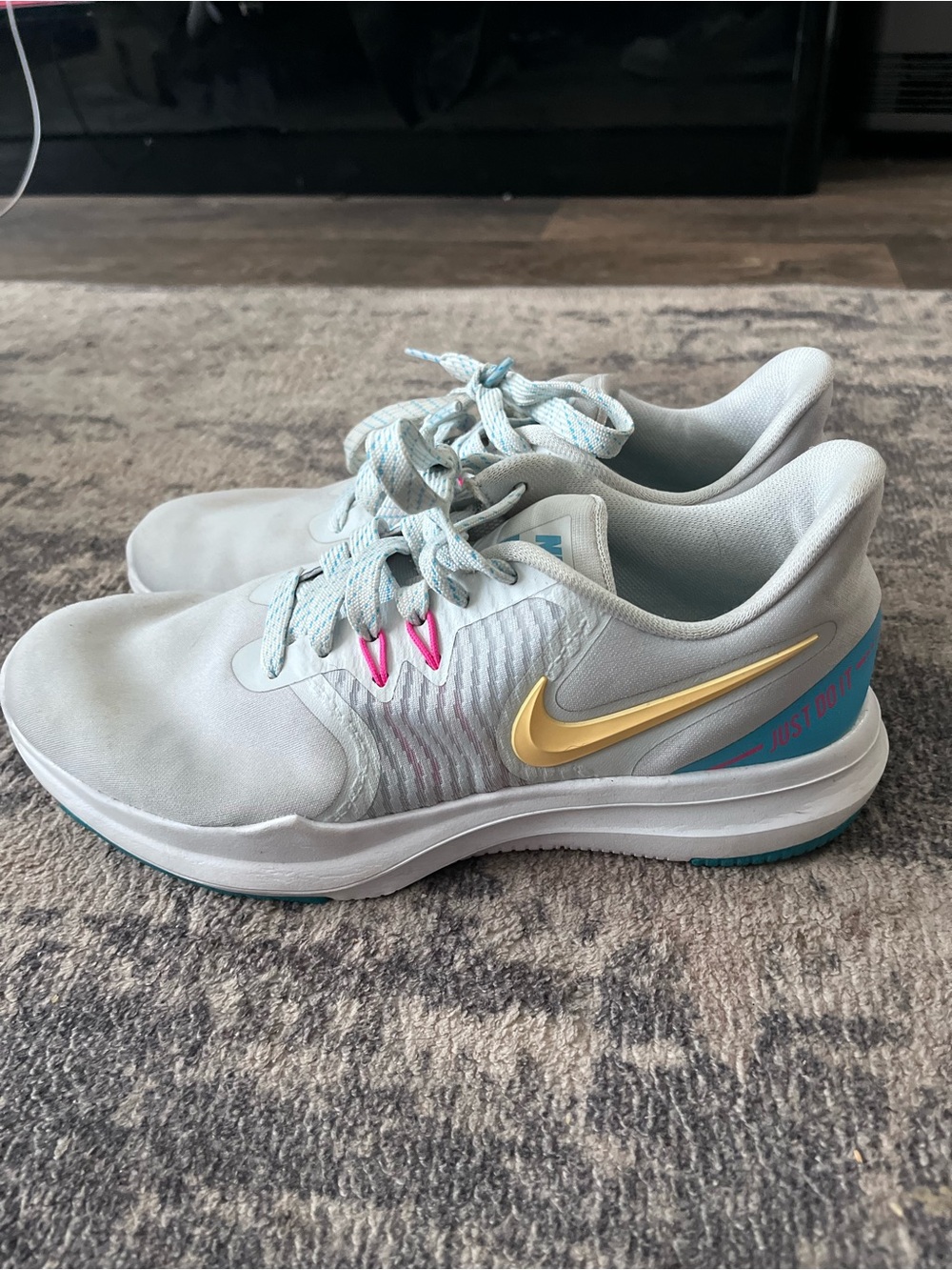 Nike Pale Gray Sneakers with Gold Swoosh and Pink Accents